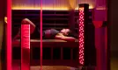 Red light therapy bed in a professional tanning salon