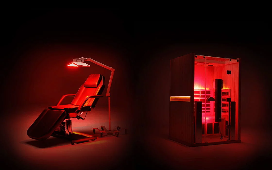Red light sauna and lightstim equipment shown in a red glow.